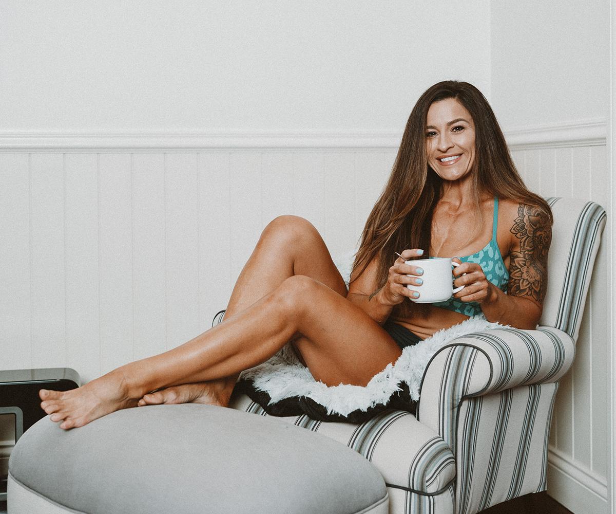 Bulk Nutrients Ambassador Tammie Sarkozy setting on a chair with Green Tea