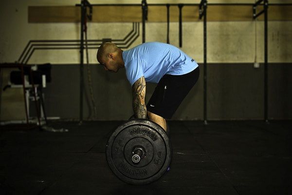 This is rounding your back -- don't do this ever!