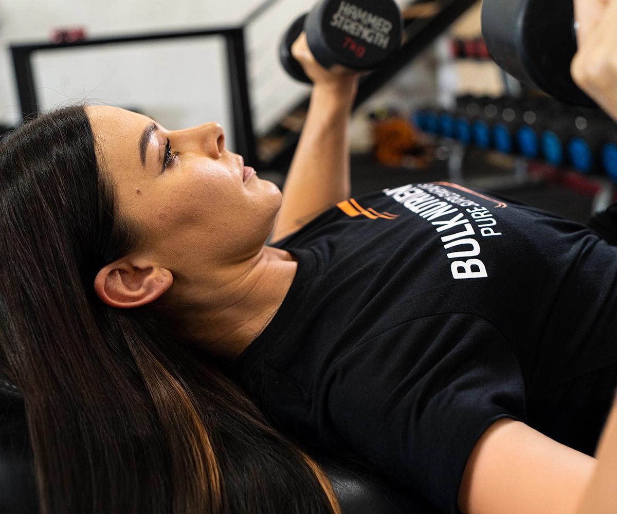 Ellena Tsatsos at the gym doing weights