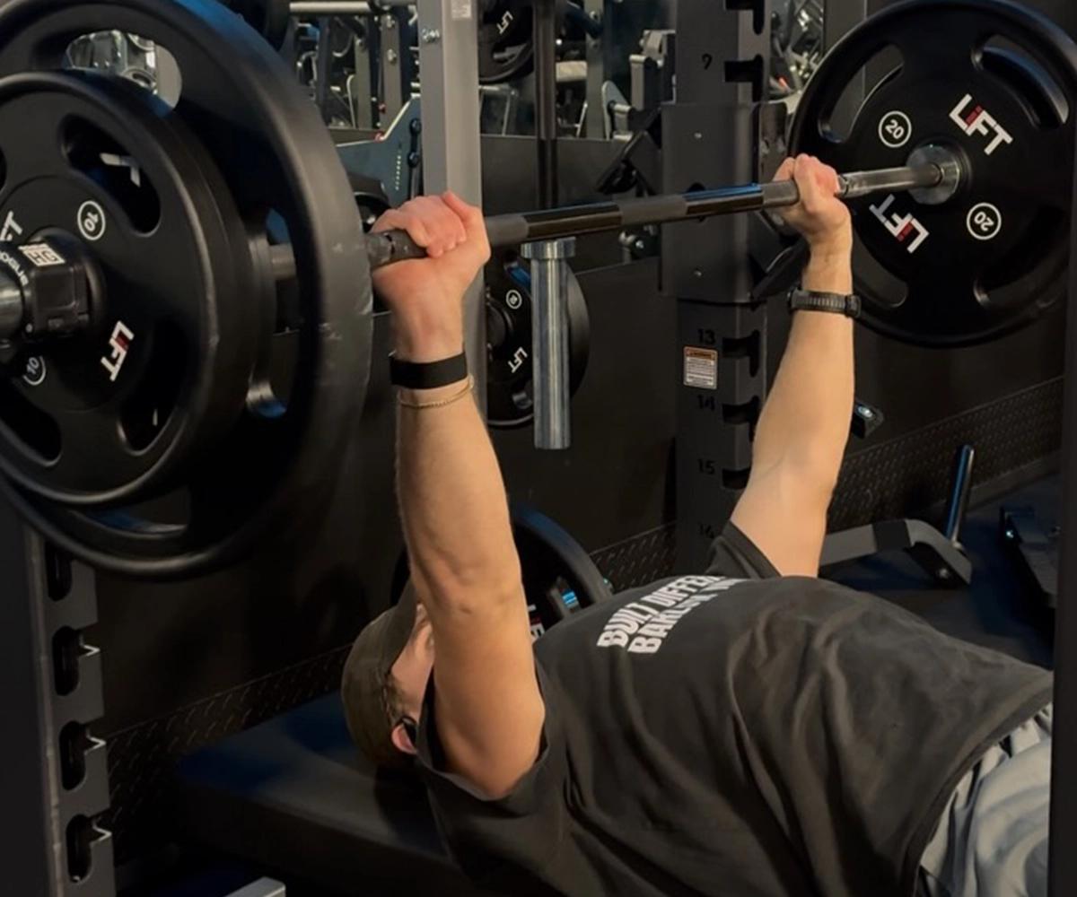 BN Ambassador Jakob Barlow lifting weights in the gym