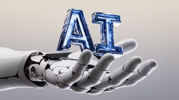 https://unsplash.com/photos/a-robot-hand-holding-a-letter-that-says-ai-OFxYMp8VkdI