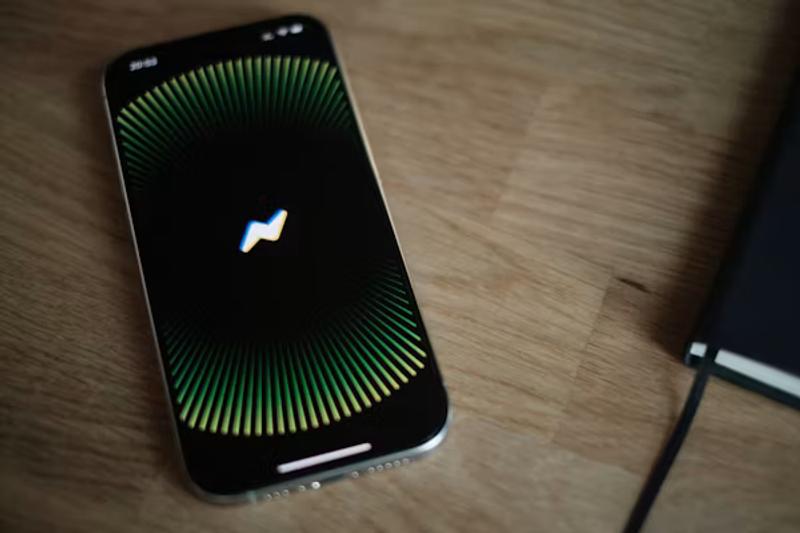 a-close-up-of-a-cell-phone-on-a-table