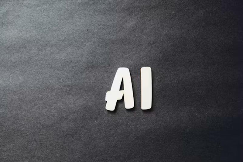 https://unsplash.com/photos/the-word-ai-spelled-in-white-letters-on-a-black-surface-ViC0envGdTU