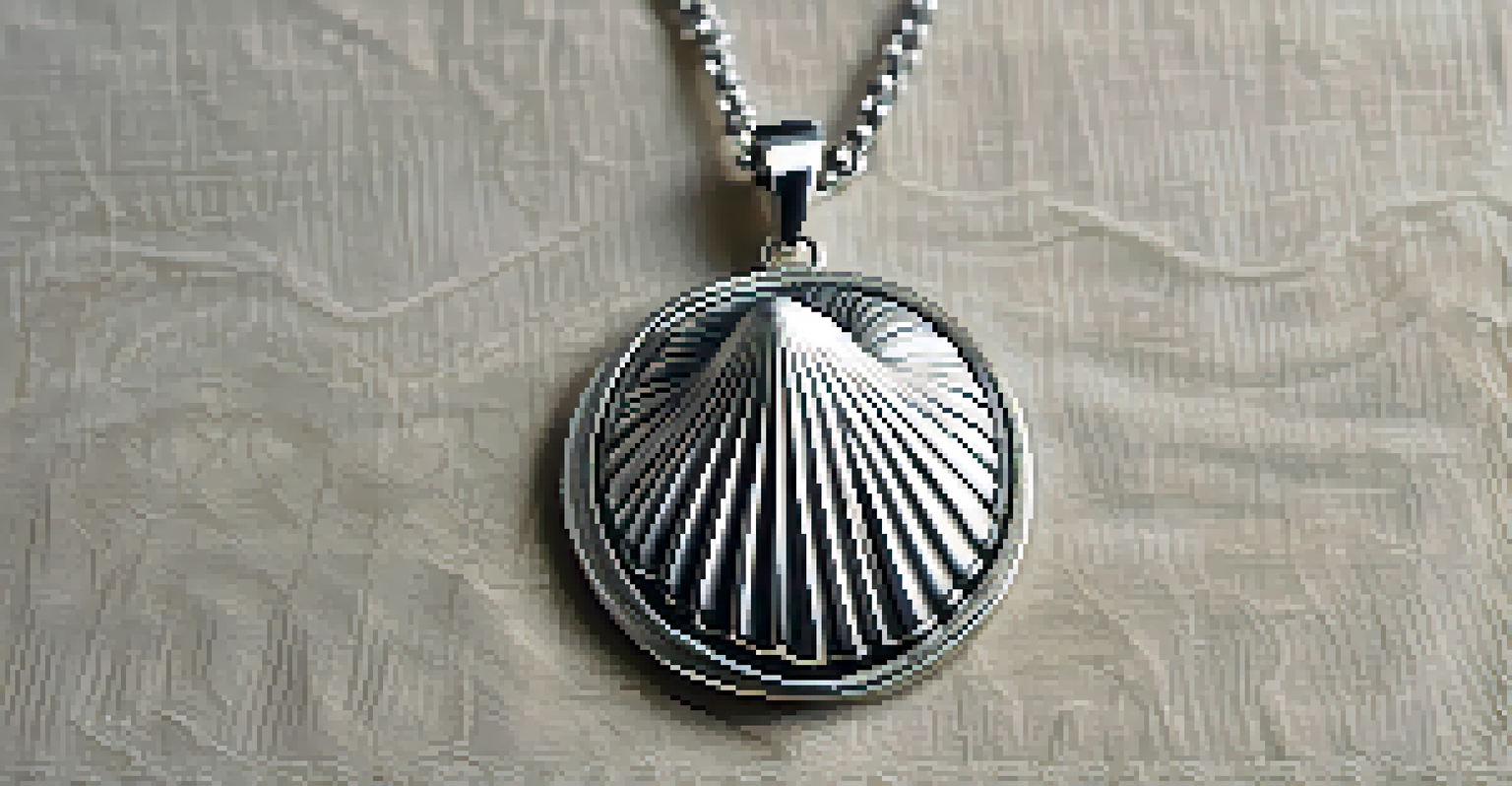 Silver pendant shaped like a seashell with detailed relief carving, displayed on textured fabric background.
