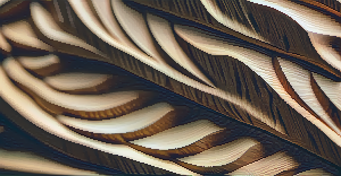 A detailed view of a wooden sculpture showcasing intricate grain patterns under warm lighting.
