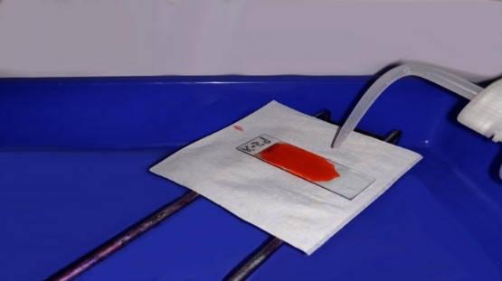Figure 5 — Rinse with water.