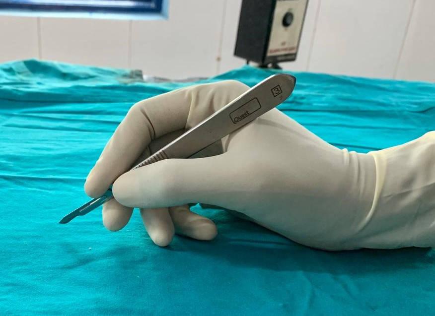 Figure 2 - Scalpel held in pencil grip.