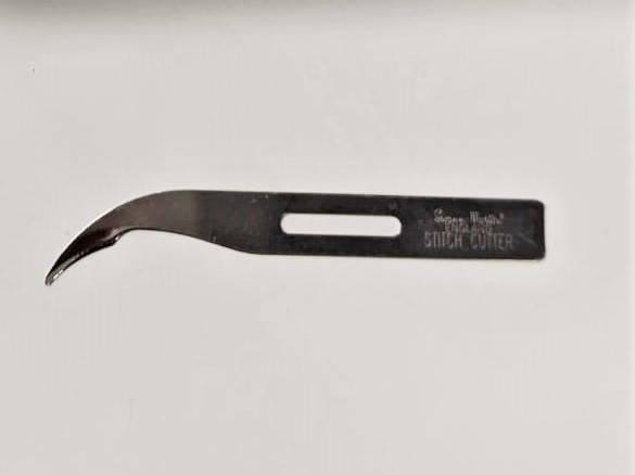 Figure 4 - Disposable hook blade for suture removal is an alternative to suture scissors.