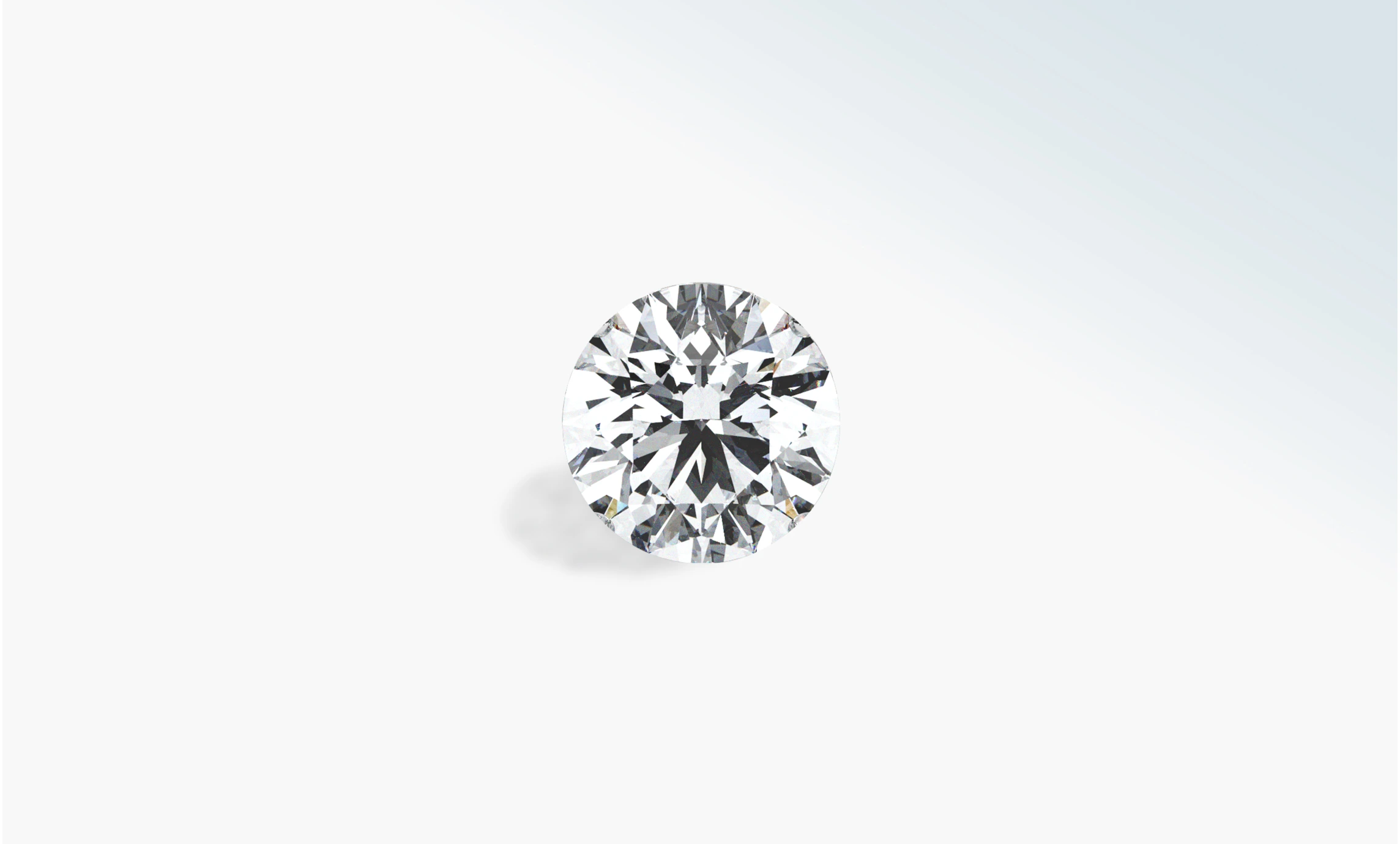 Loose round brilliant diamond on a pale background