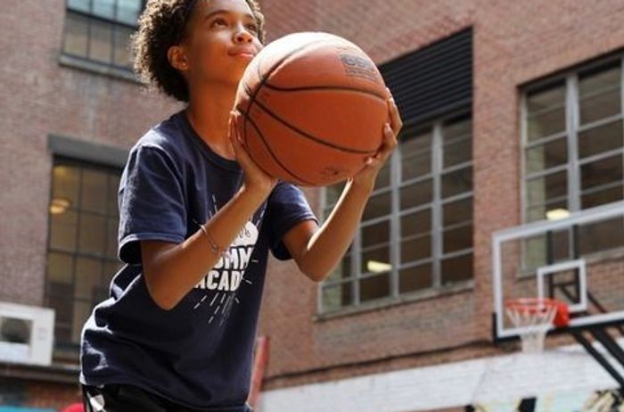 Boy playing basket ball