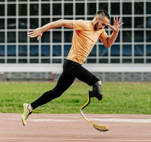 Paralympian sprinter training hard on the running track. 