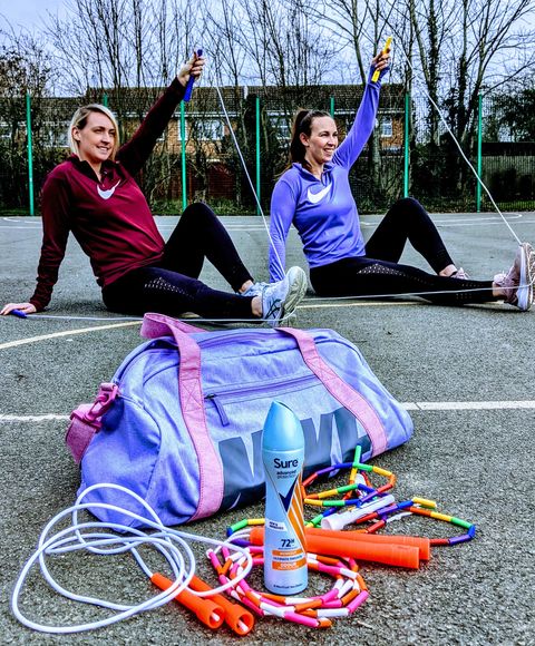 2 women sitting with skipping ropes