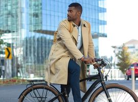 Man riding a bike in a city