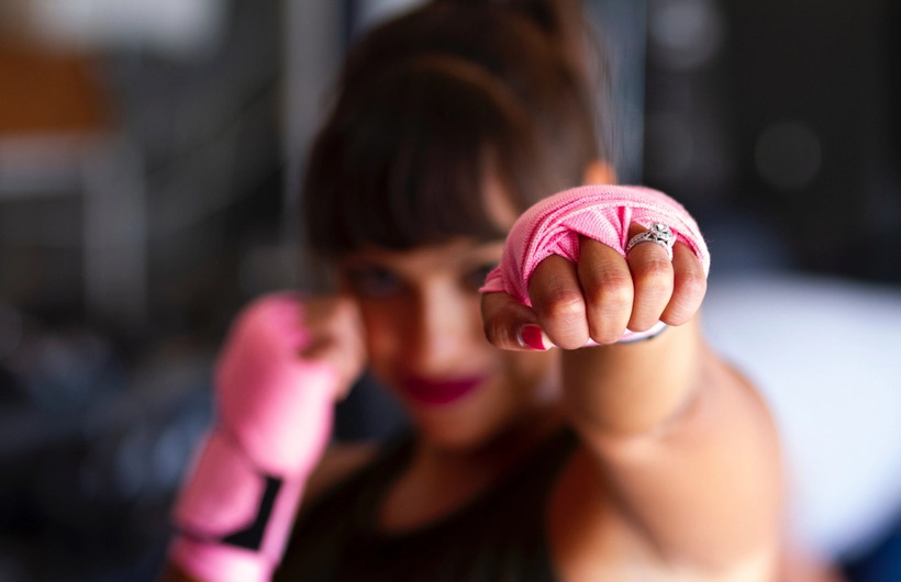 Woman with boxing glove