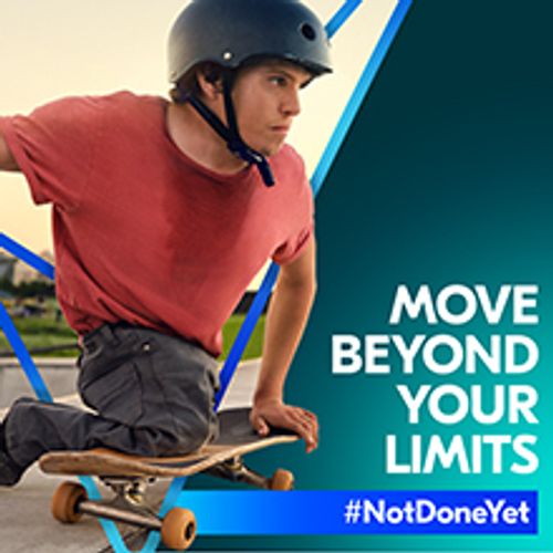 Man skateboarding with tagline of confidence to move beyond your limits