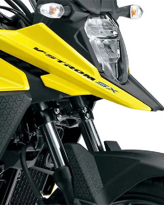 Primer plano de la suspensión delantera telescópica, pico de pato y faro LED de la Suzuki V-Strom 250 SX