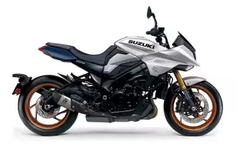 Motocicleta Suzuki Katana plateada con llantas doradas vista de perfil