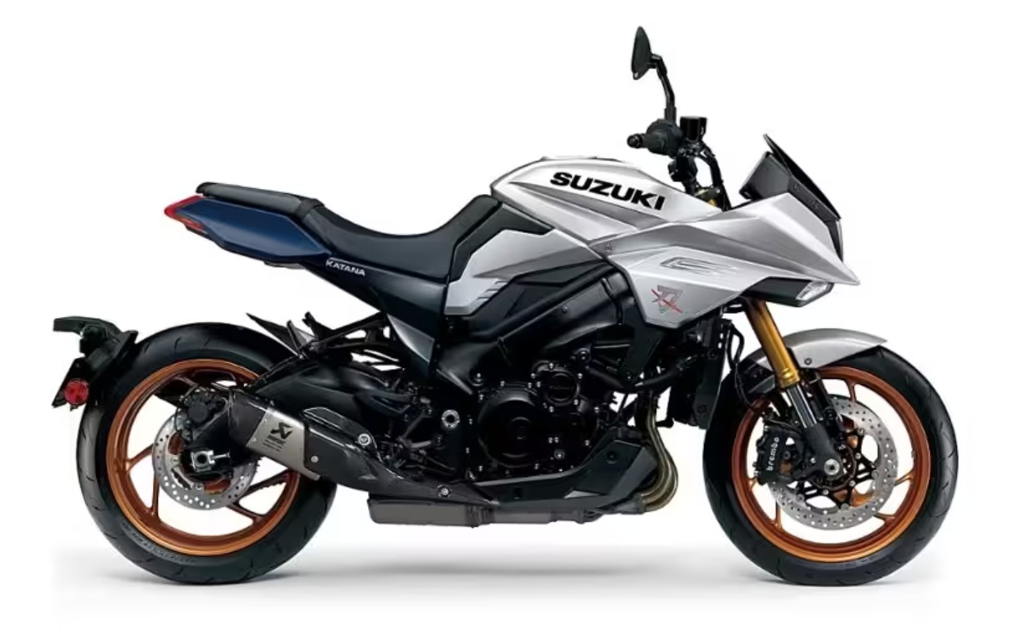 Motocicleta Suzuki Katana plateada con llantas doradas vista de perfil