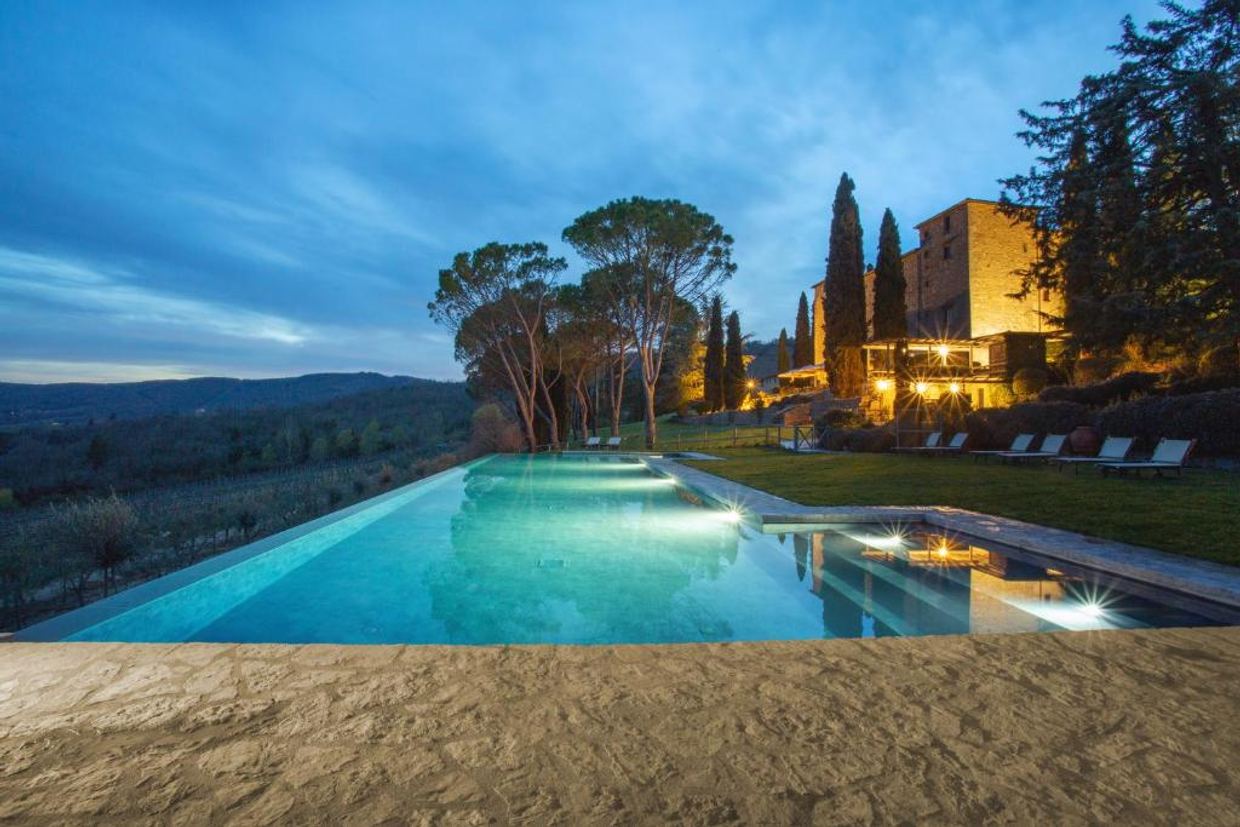 Stone-walled castle exterior of Castello di Spaltenna in Gaiole in Chianti