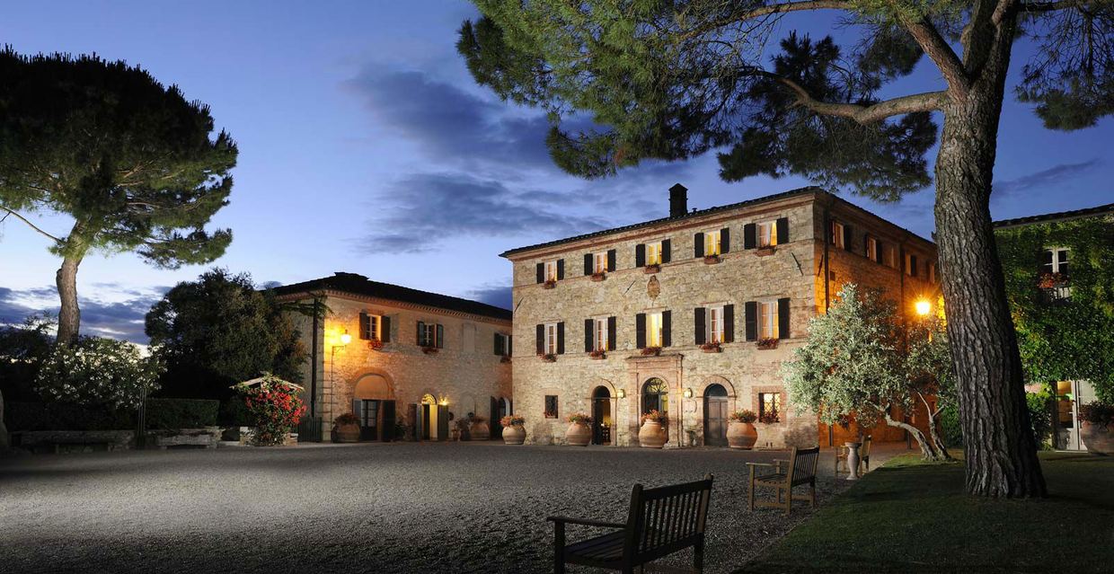 The stone piazza of Borgo San Felice, a medieval hamlet converted into a five-star hotel