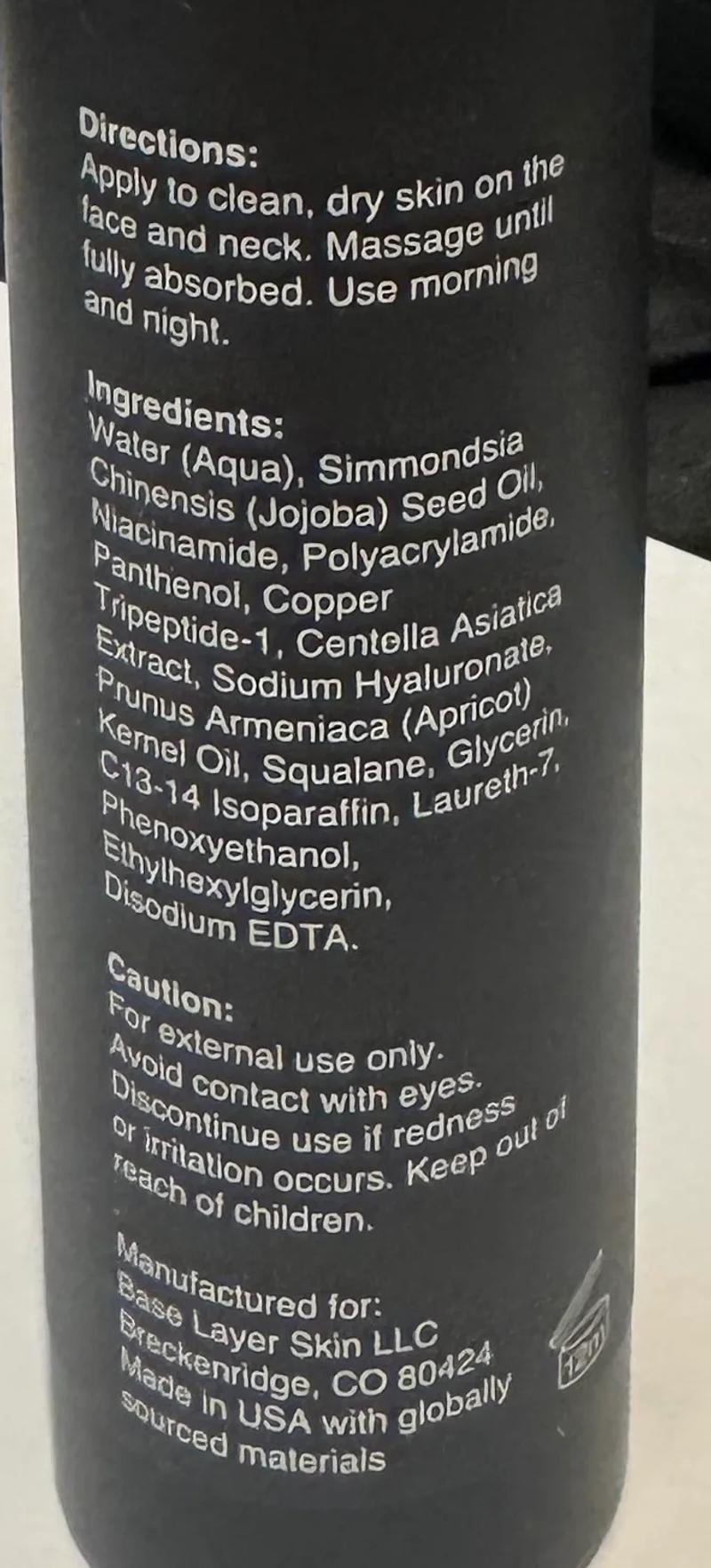 Back label of Base Layer Daily Face Cream showing the full disclosed ingredient list.