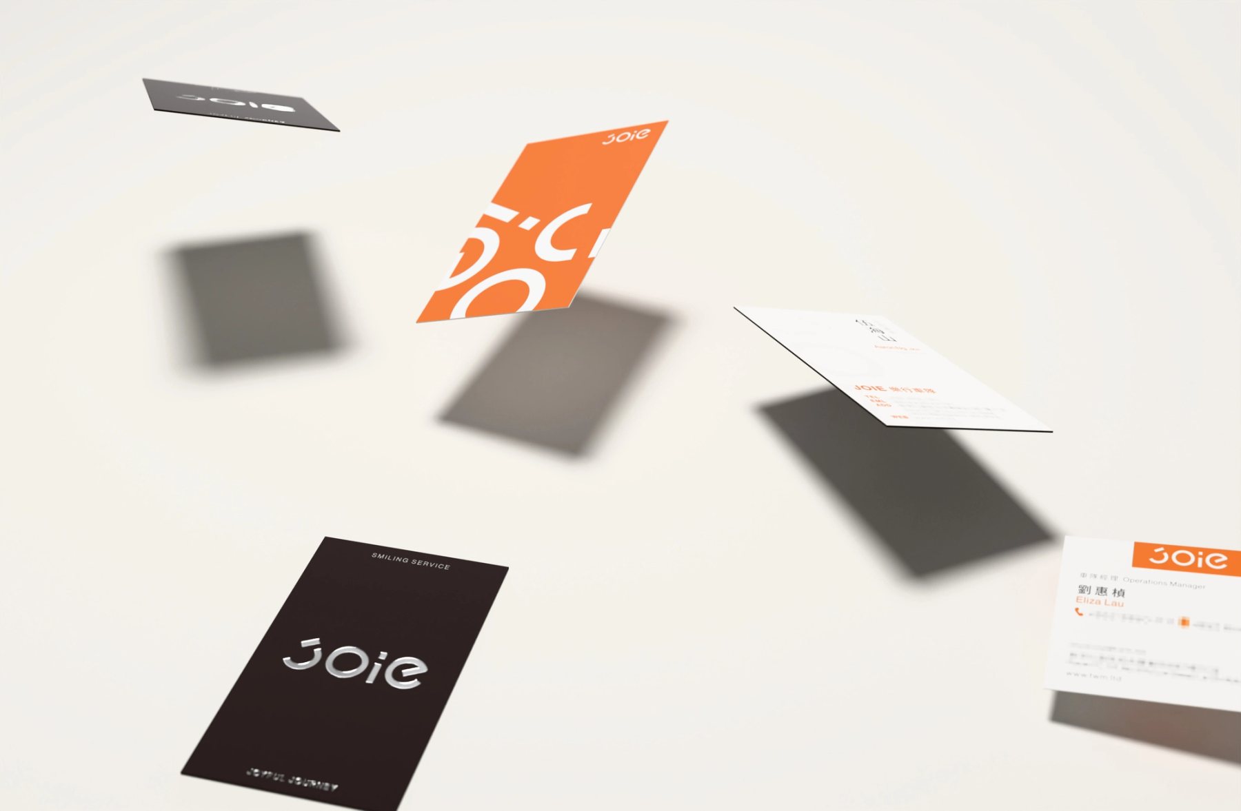 JOIE 三款名片飄落排列的 3D 概念圖