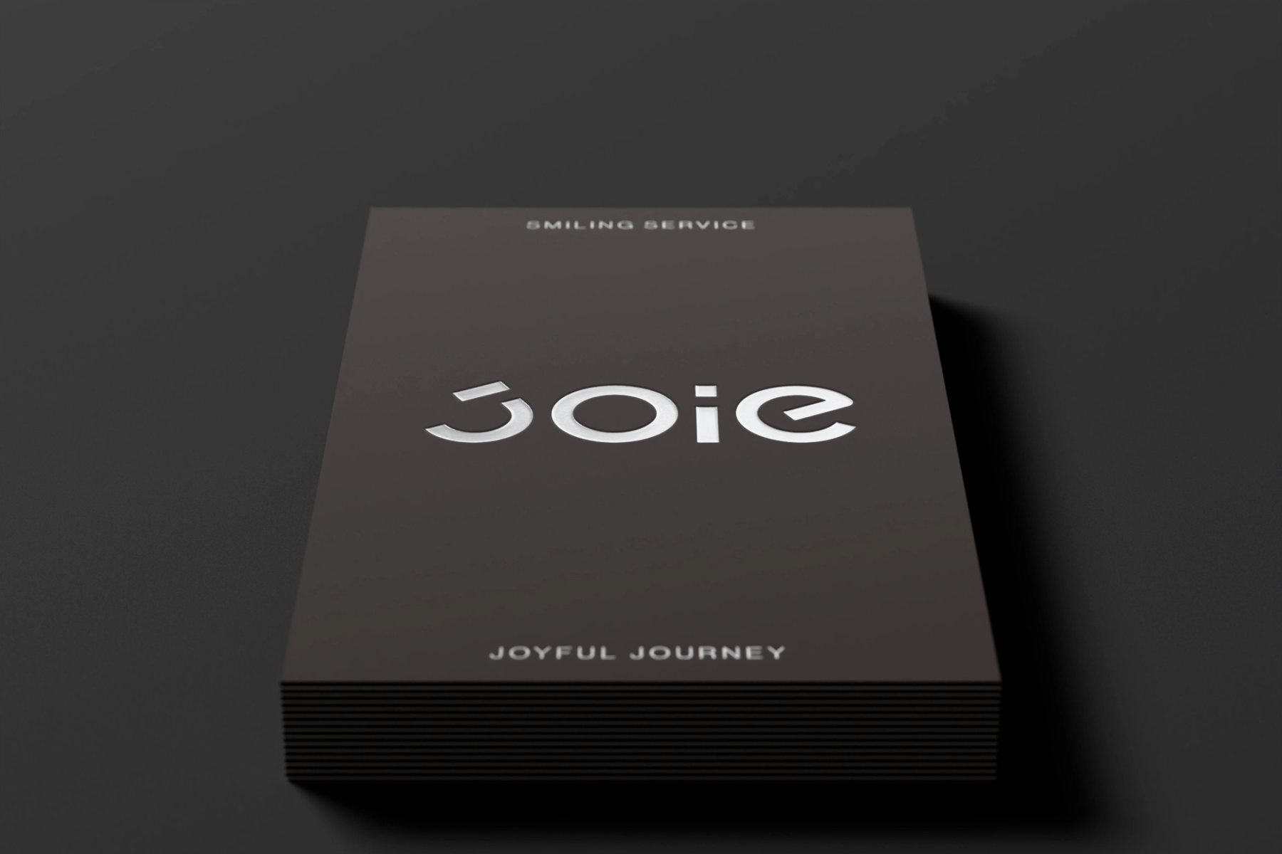 JOIE 黑色商務款名片 3D 渲染，完整字標位於中軸