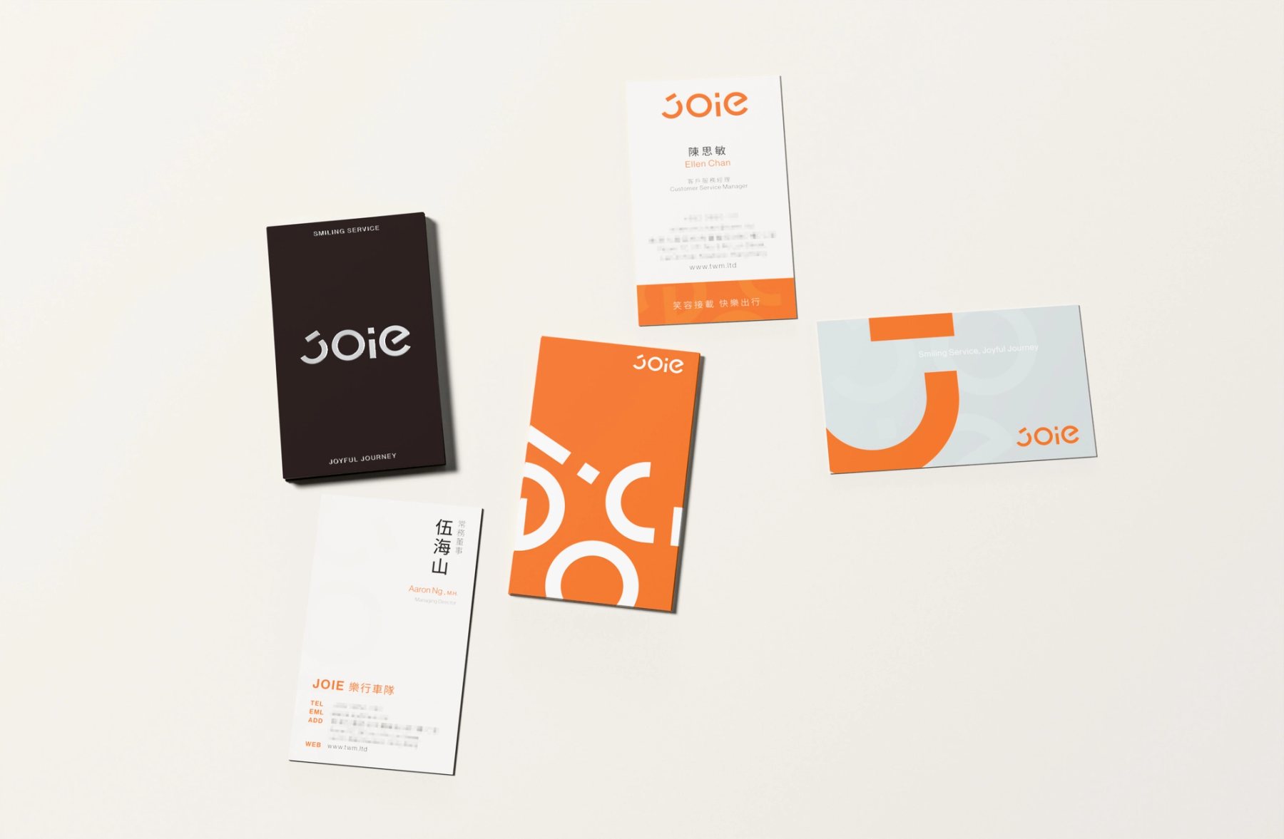 JOIE 三款名片提案並列，呈現黑、橘、灰三種角色方向