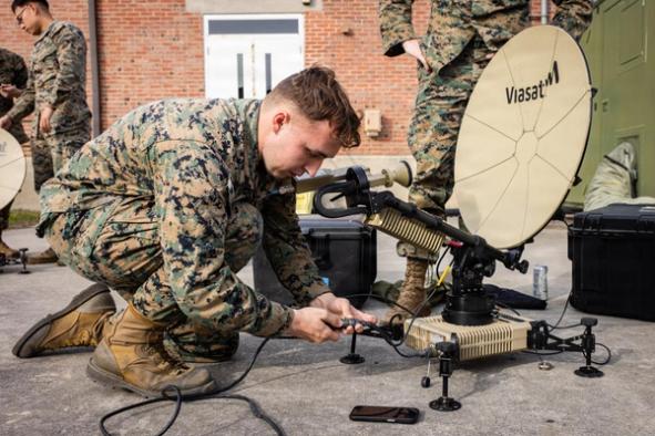 US Marines operate satellite communication terminals during a training exercise