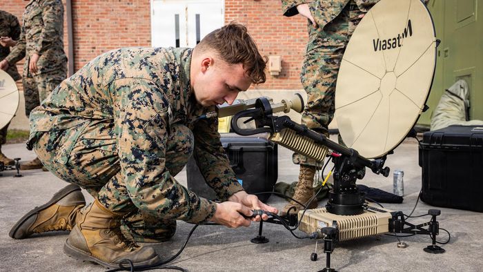 US Marines operate satellite communication terminals during a training exercise