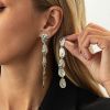 03 White K Earrings