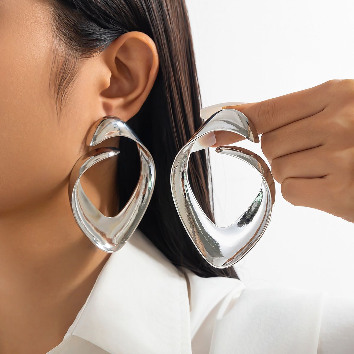 03 White K Earrings