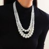 01 White K Necklace