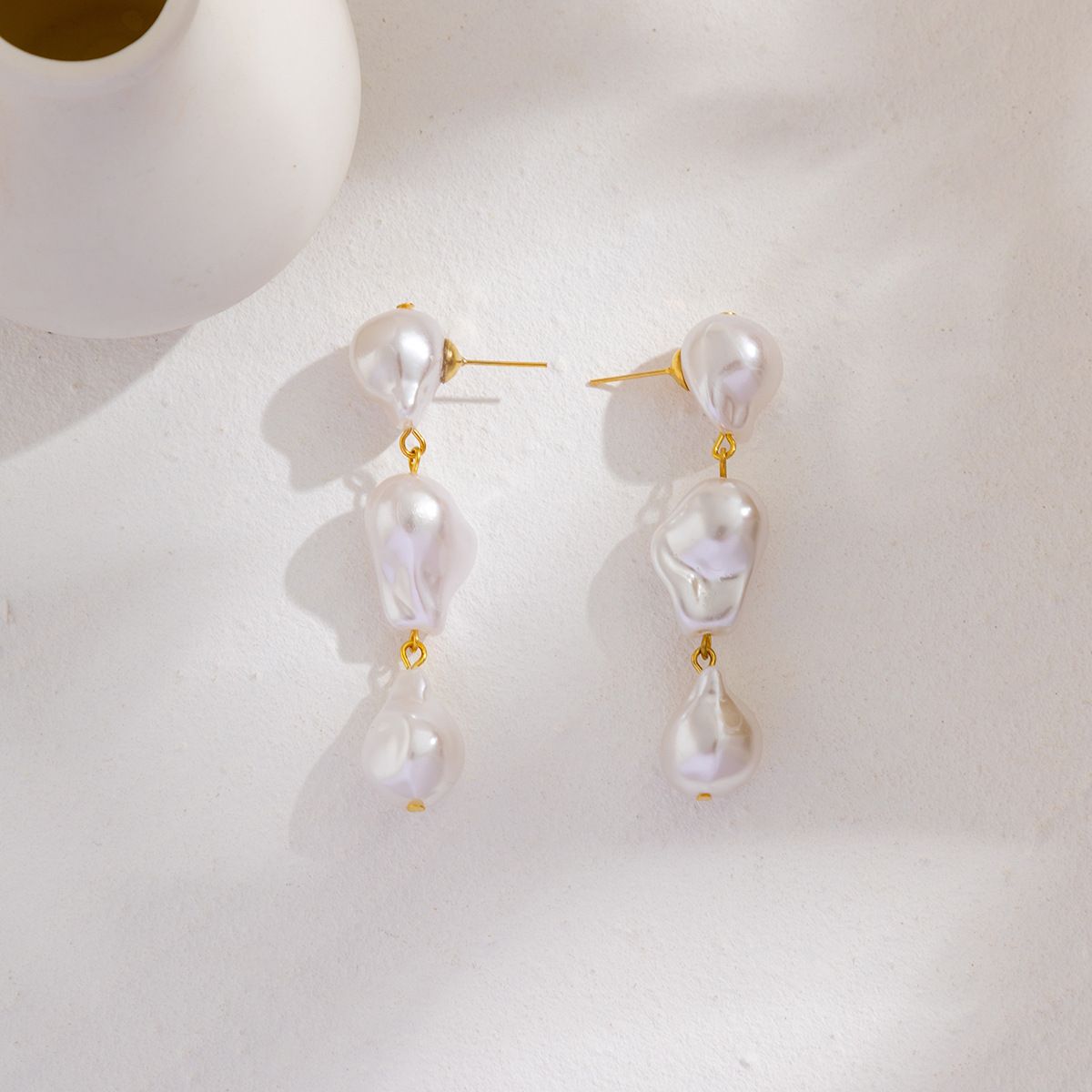 Gold ear studs