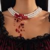 11 White K Necklace