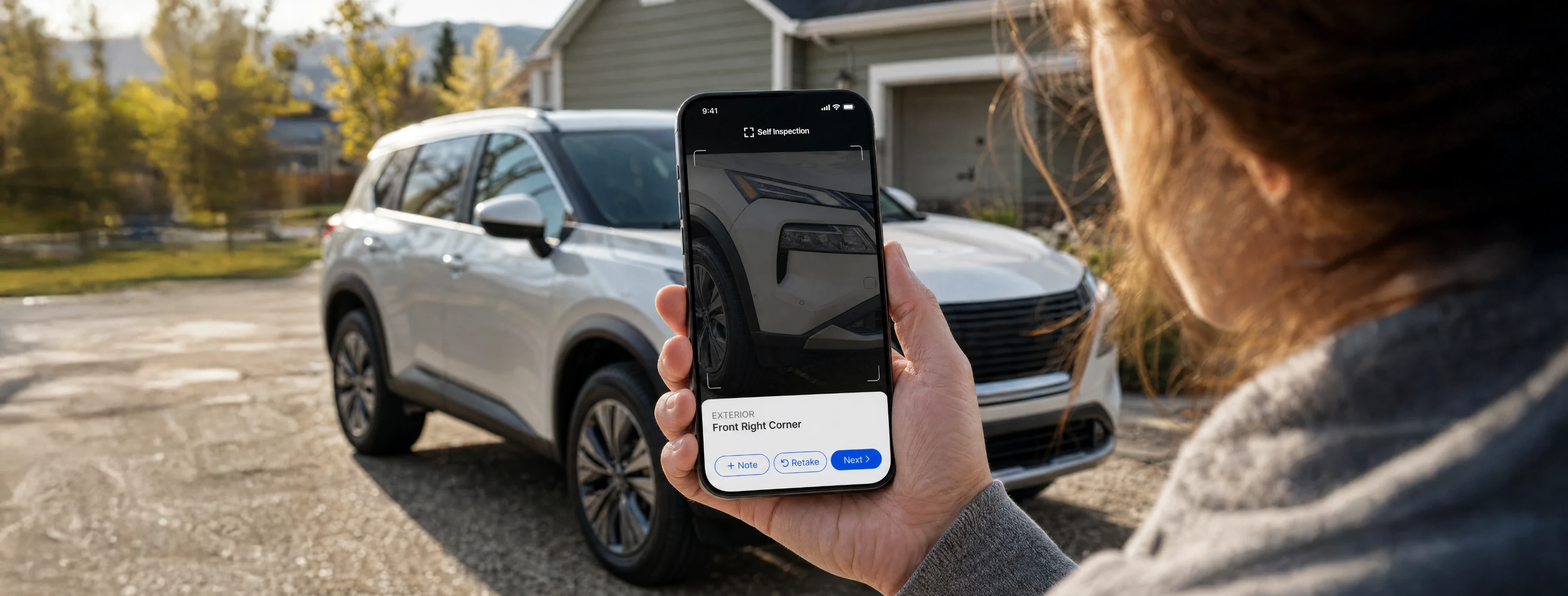 Customer capturing the front right corner of an SUV with the Self Inspection app in a driveway
