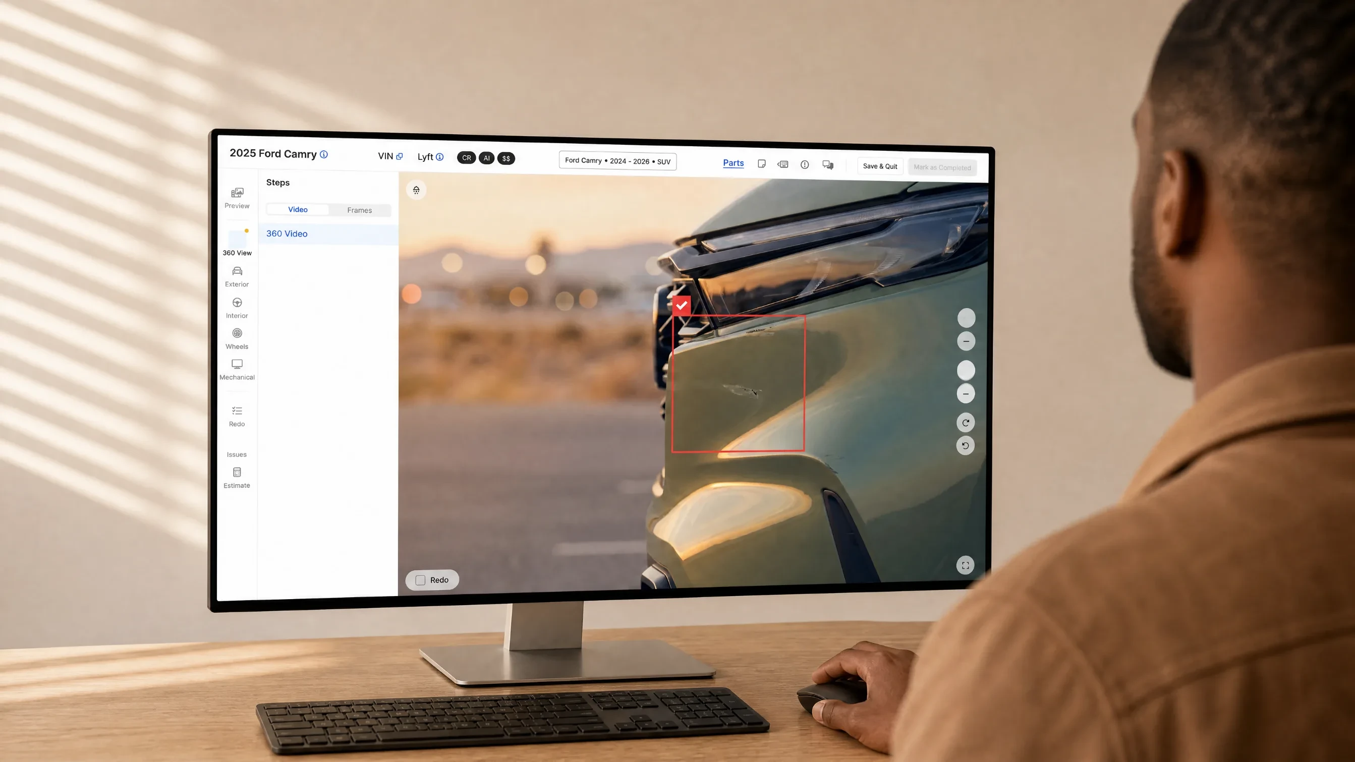 Certified reviewer confirming an AI-flagged scratch on a front fender in the review screen