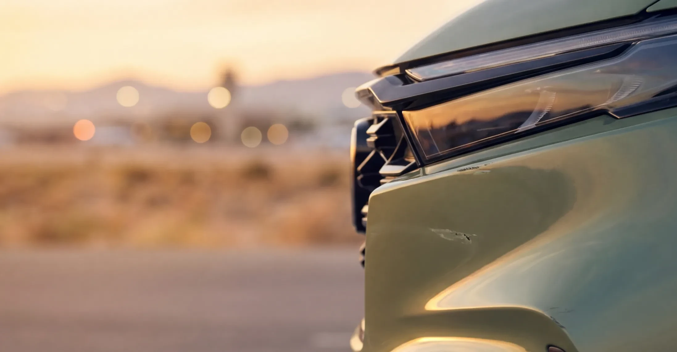 Scratch on a front fender below the headlight