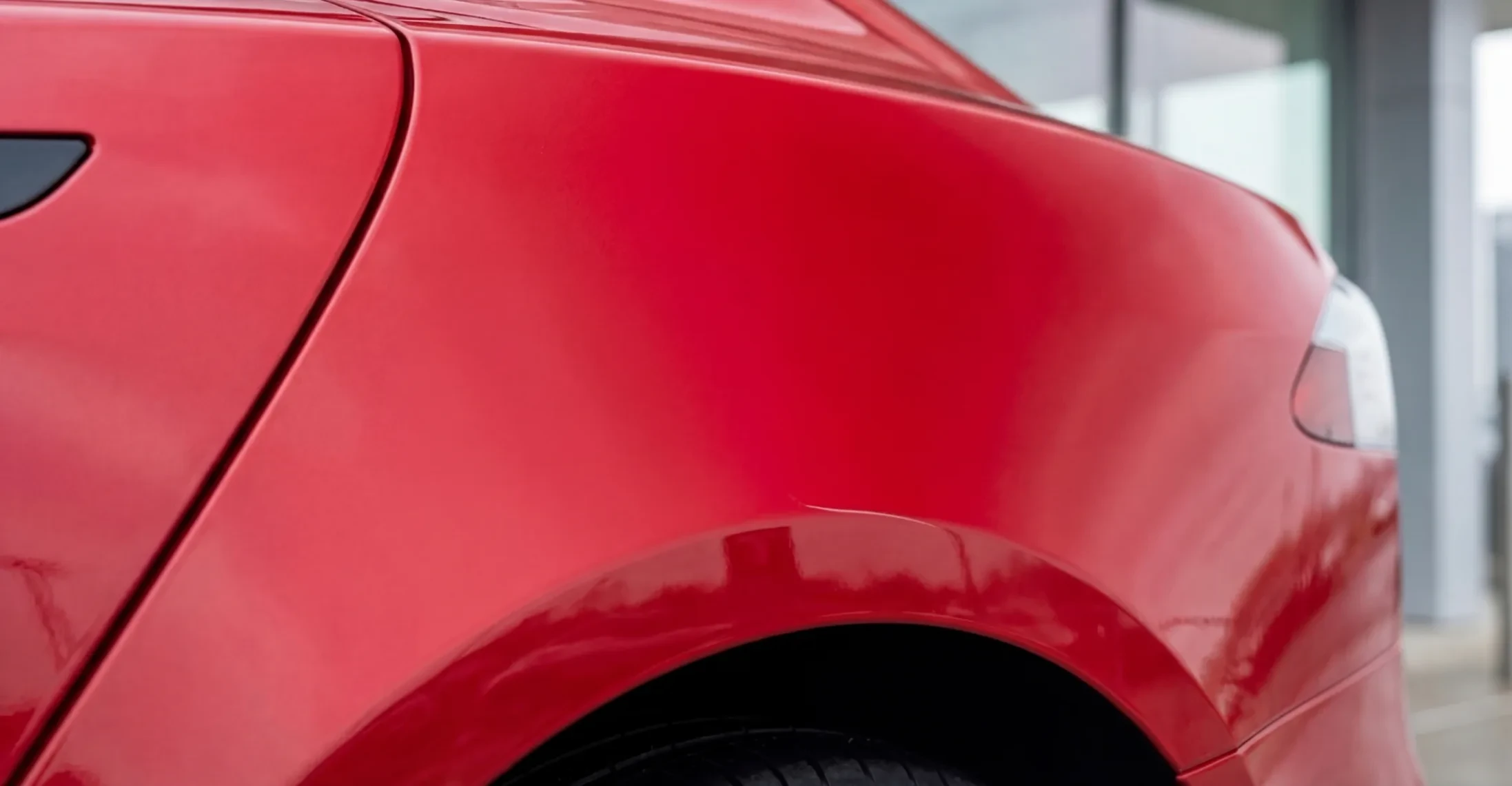 Dent above the rear wheel arch