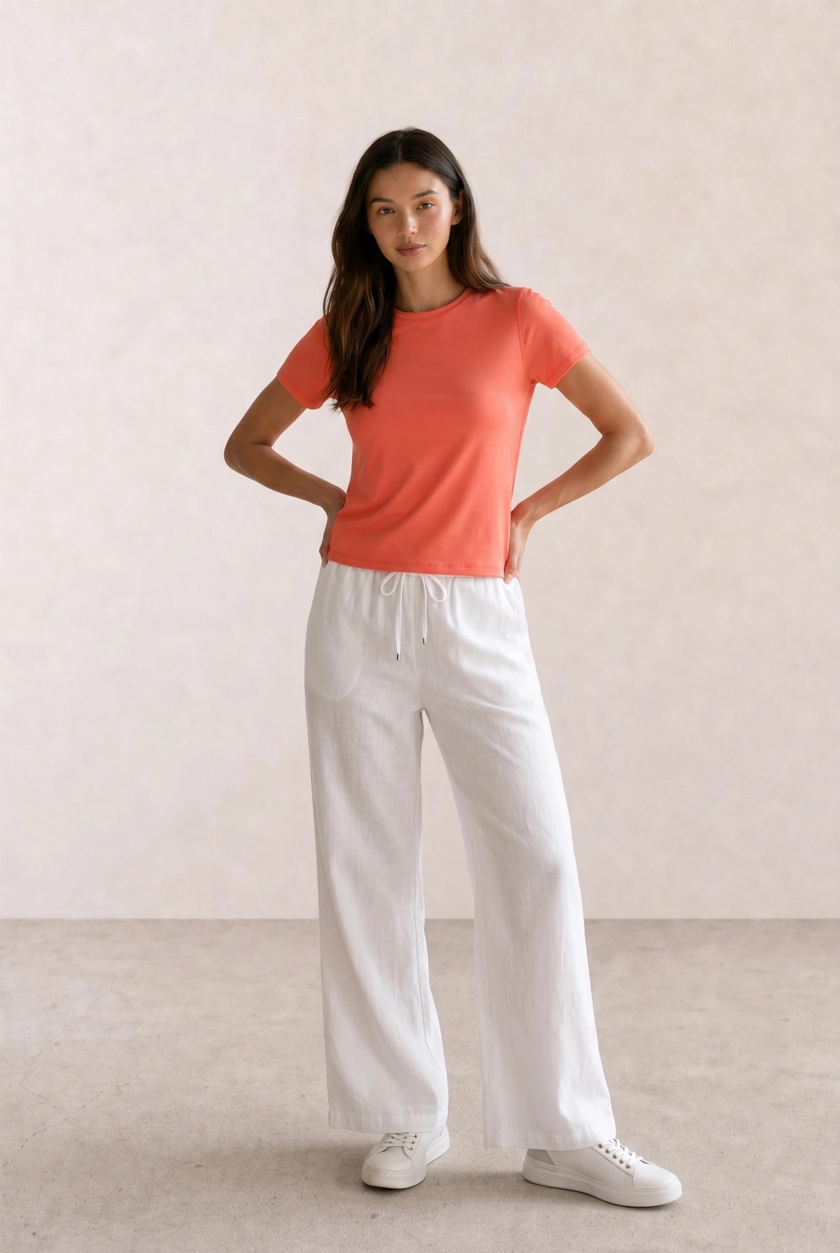 Coral Tee & White Linen Wide-Leg Trousers