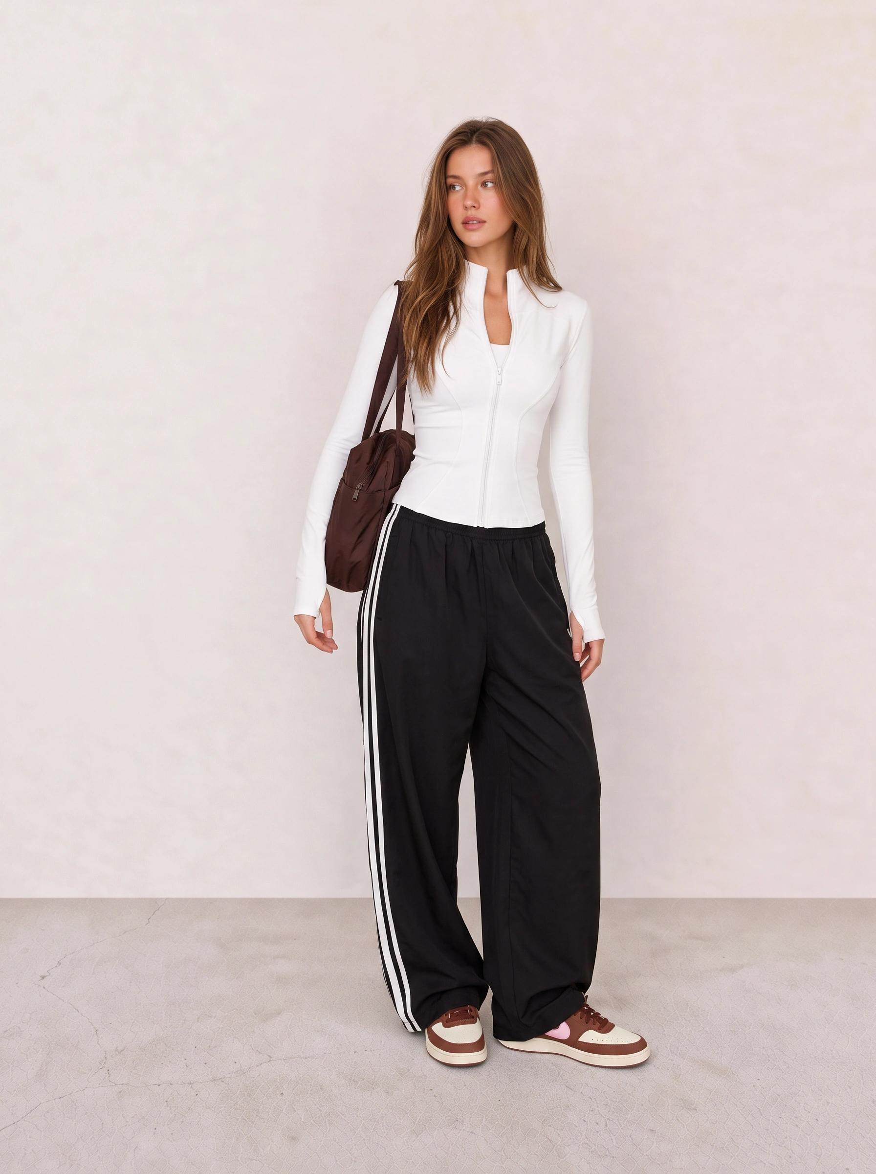 White Zip Top and Black Track Pants Athleisure Outfit