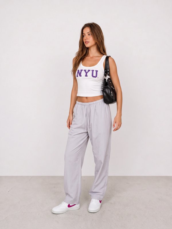 NYU Tank and Grey Travel Trousers Outfit