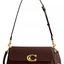 Burgunderrote Coach-Schultertasche