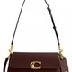 Burgunderrote Coach-Schultertasche