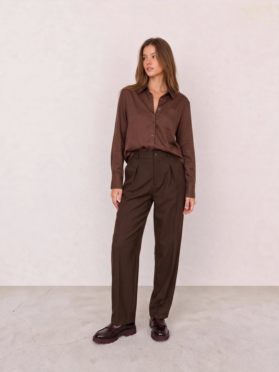 Old money look with brown button-down shirt & brown pleated tapered trousers and burgundy lug-sole loafers