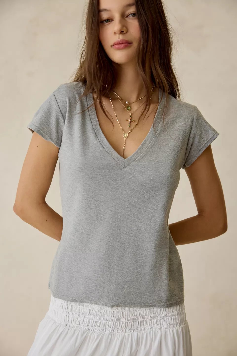 grey v-neck t-shirt cream wide-leg trousers neutral outfit