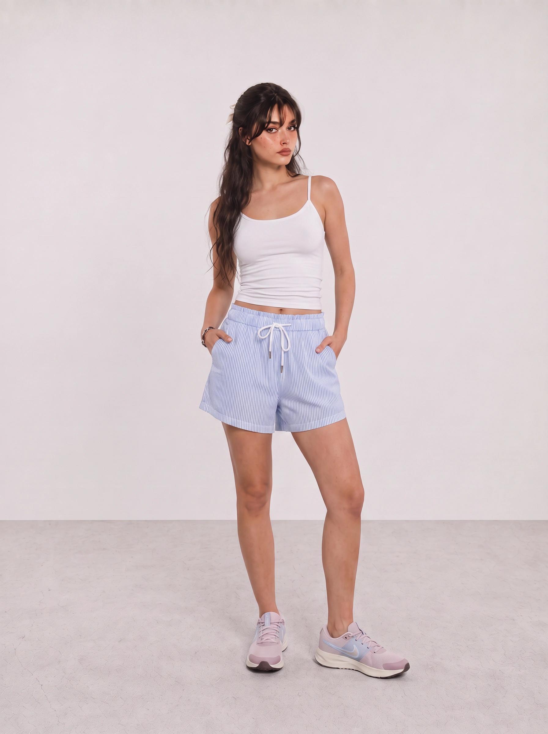 White Cami and Blue Stripe Shorts Travel Outfit