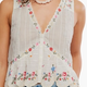 Cream Floral Embroidered Peplum Top