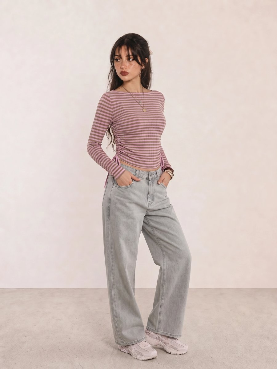 Mauve striped ruched top with wide-leg jeans and Nike pale pink sneakers