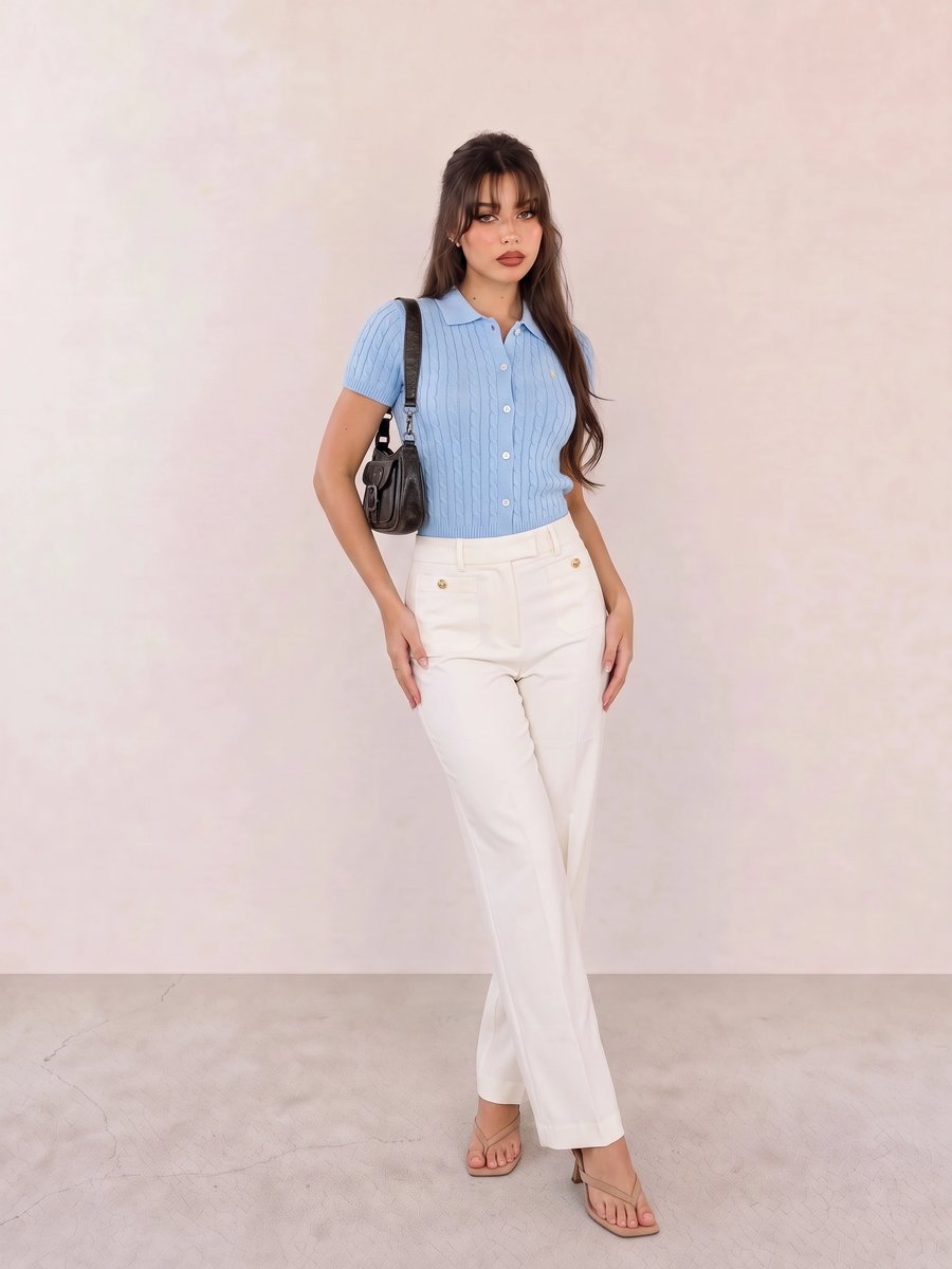 Old money look with light blue short-sleeve knit cardigan & white wide-leg trousers and tan strappy kitten-heel sandals